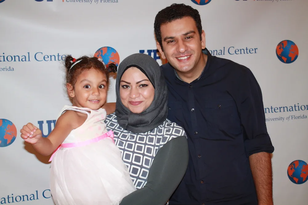 Rasha Elhesha with her husband and daughter