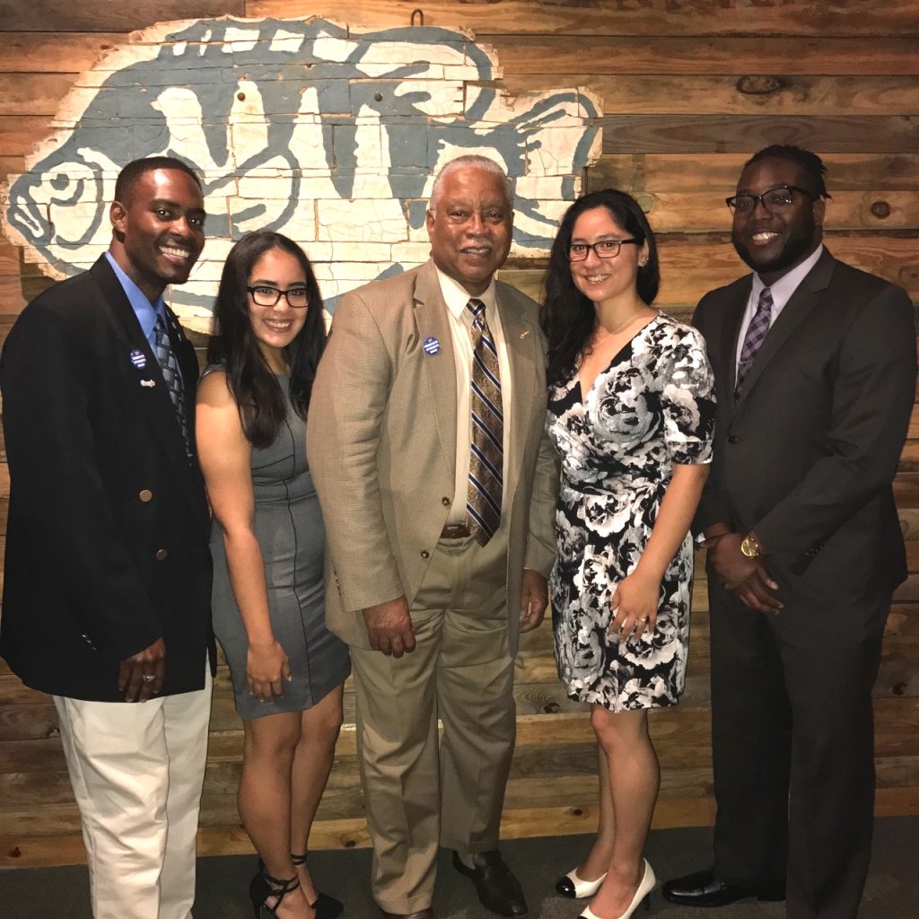 A group poses for a photo at the AEL Honor Society Induction
