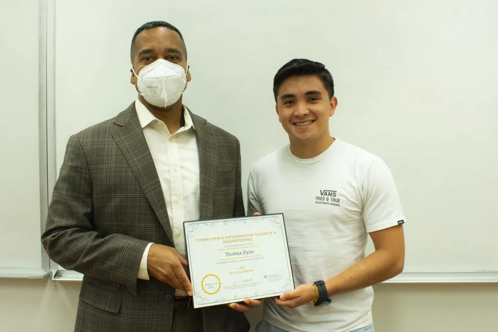 Juan E. Gilbert, Ph.D., CISE department chair, with Thomas Pena, a recipient of the LAC Scholarship.
