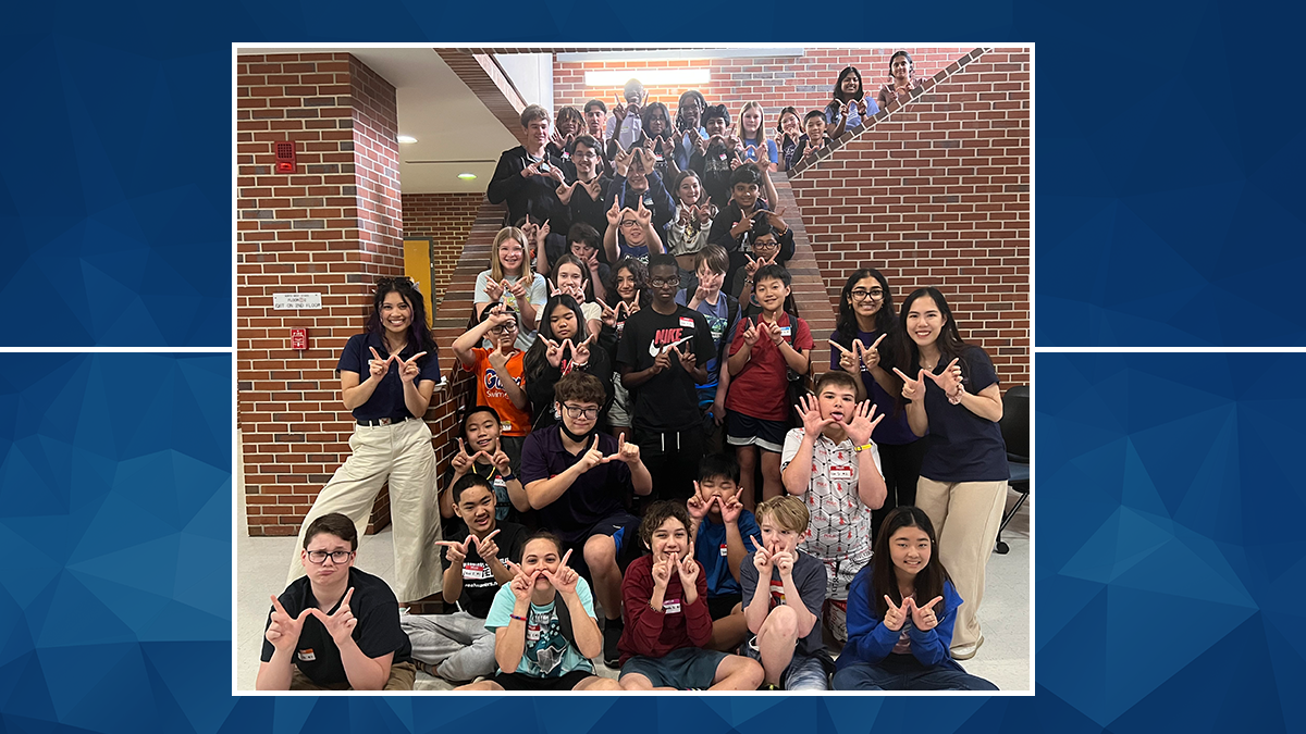 Code-A-Thon middle and high school participants with WiCSE members.